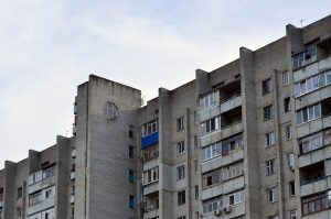 Old multi-storey apartment house in a poorly-developed region of Ukraine or Russia