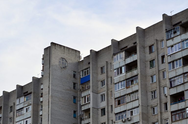 Old multi-storey apartment house in a poorly-developed region of Ukraine or Russia